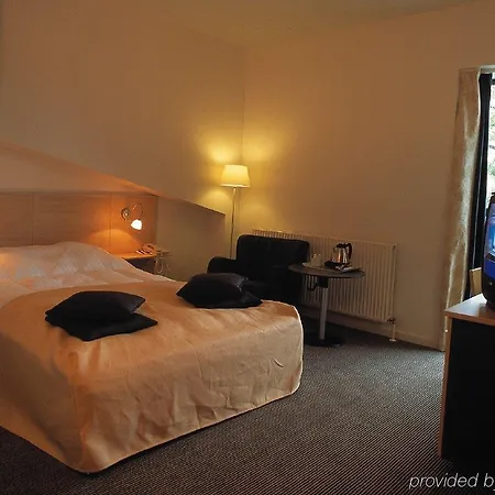 מלון Radisson Papirfabrikken 4*
